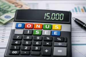 Bonus ISEE 2026 sotto i 15.000 euro, calcolatrice con display 15.000 e scritta BONUS ISEE su documenti economici